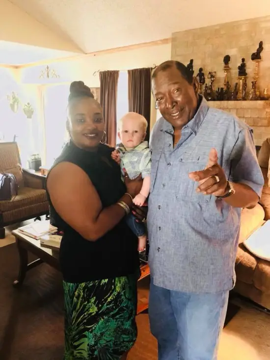 Milton West Holds Cody Shugart's Baby, Photo Goes Viral