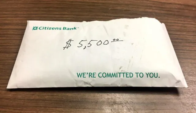 Woman Hands Police Citizens Bank envelope — Now They're Looking For Her