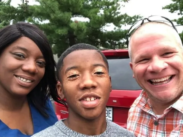 Joe Holt Cop Stops Teen Who Ran Up To Elderly Woman In Rain