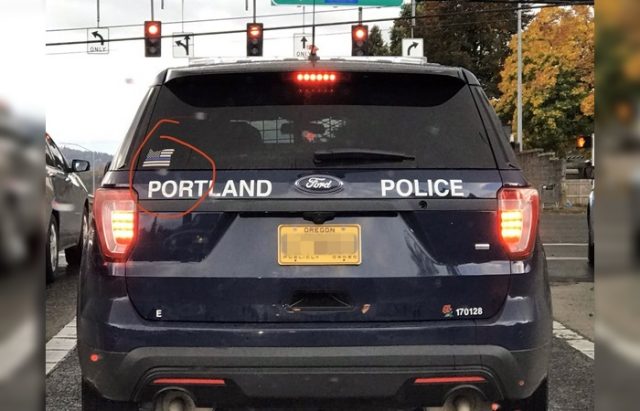 Lindsey Burrows Activist Claims Police SUV Window Sticker Is Terrifying Warns Of Potential Lawsuit